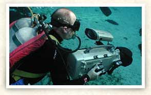 Photo of scuba diver with camera in Silver Glen